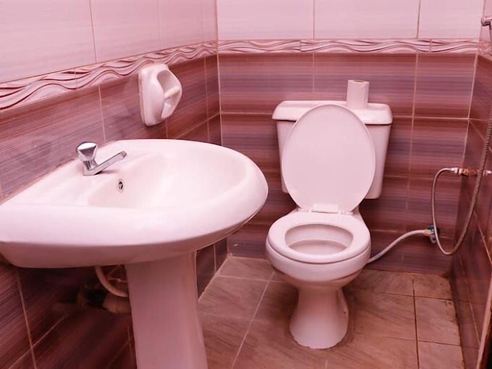 Shower, free toiletries, slippers, towels