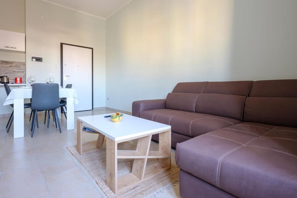 Comfort Apartment, City View | Living area | Flat-screen TV