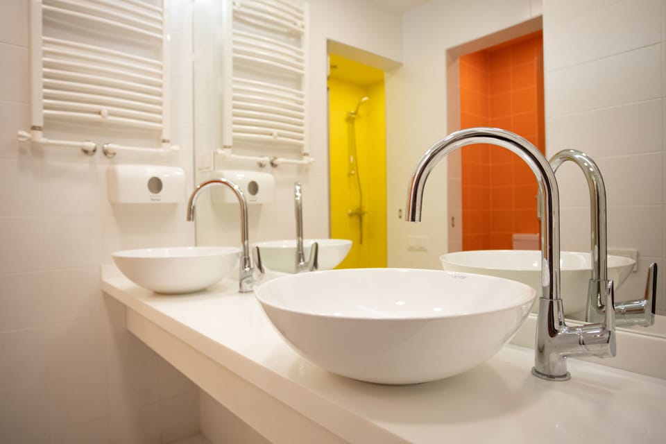 Shared Dormitory (4 Beds) | Bathroom | Shower, hair dryer, slippers