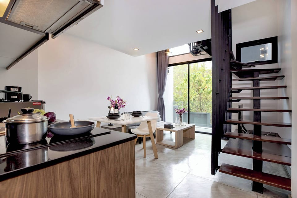 Design Apartment, 1 Bedroom, Balcony | Living area | 36-inch flat-screen TV with cable channels