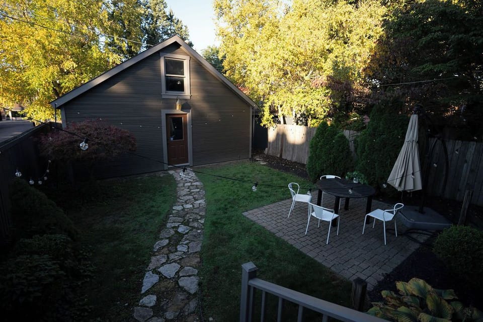 Where cityscape meets serenity: Enjoying the urban oasis vibes from this cozy patio.