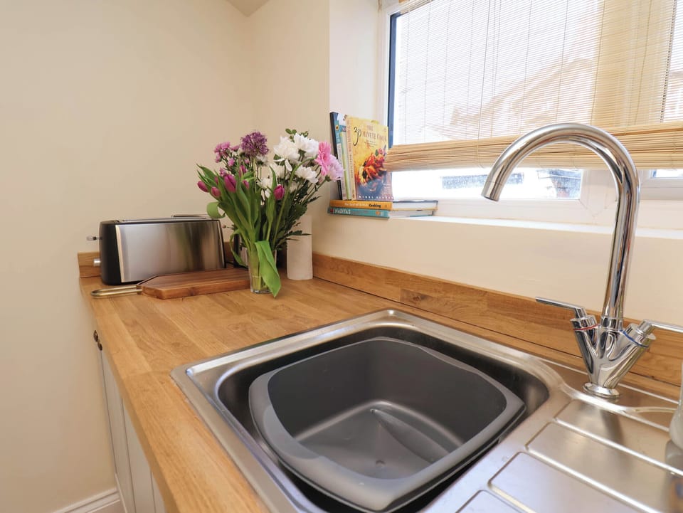 Fridge, microwave, cookware/dishes/utensils