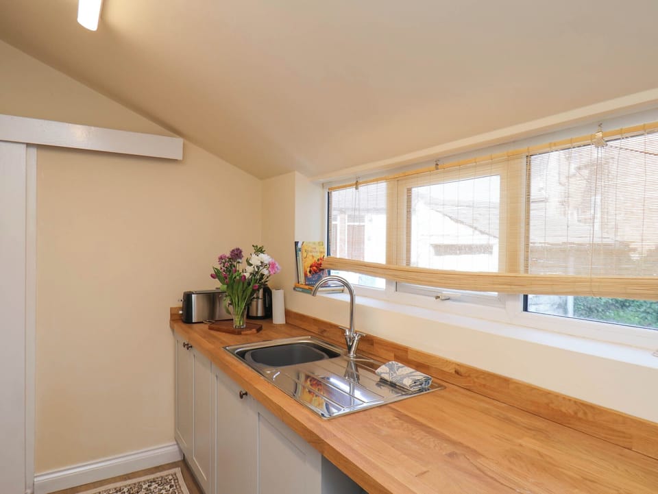 Fridge, microwave, cookware/dishes/utensils