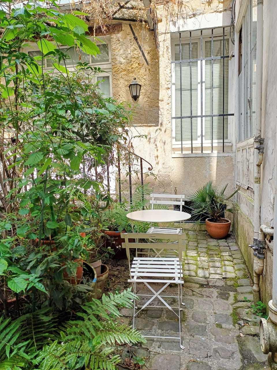 Enjoy the coffee table (please mind the noise. It is not a private courtyard)