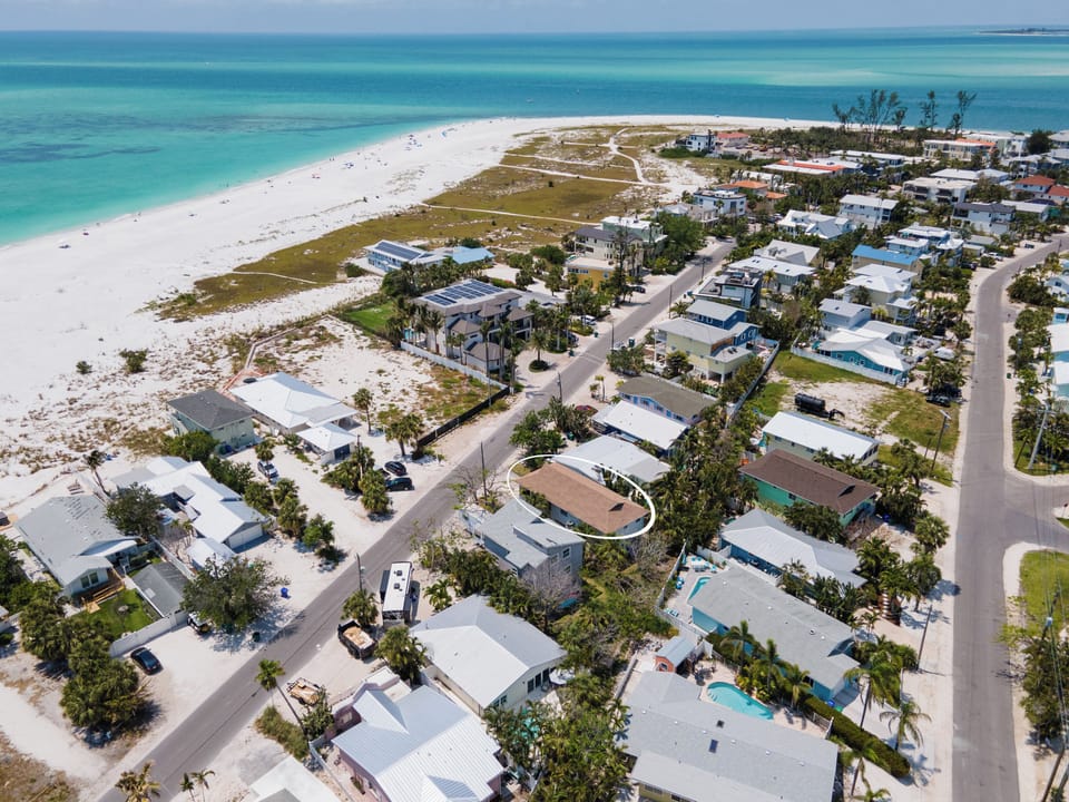 Aerial showing the beautiful North End beaches across the street