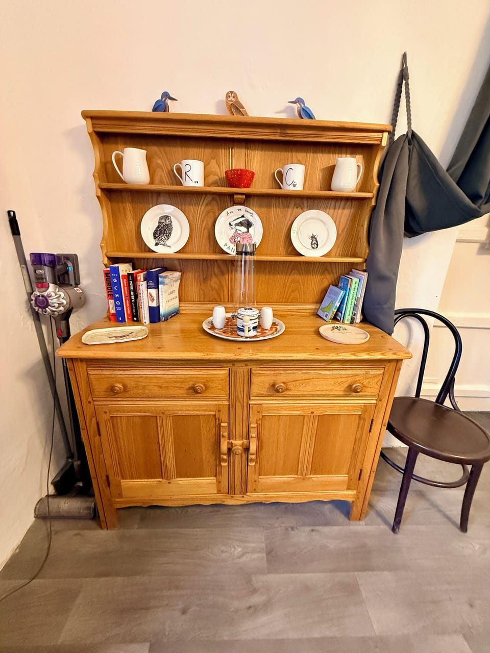 Dresser with books and games to use during your stay