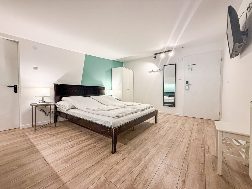 Attic Double Room | Minibar, in-room safe, desk, laptop workspace