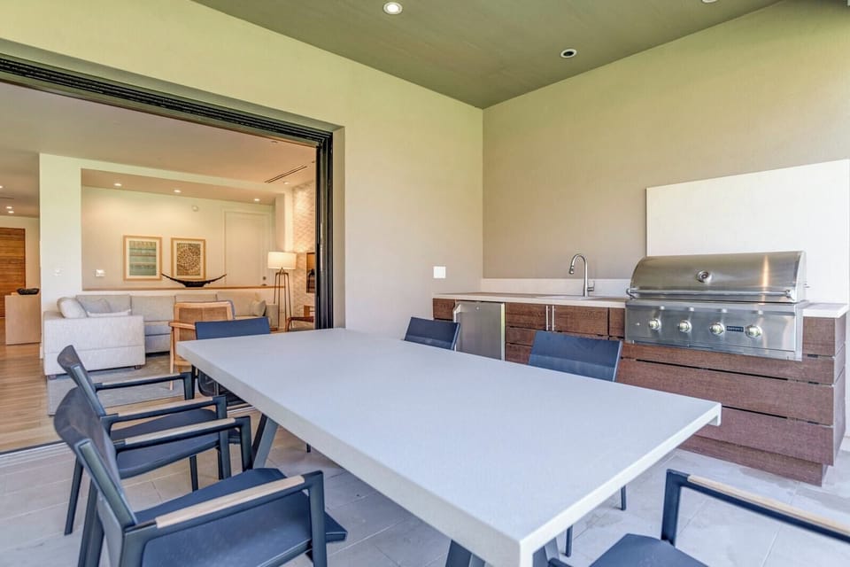 Modern outdoor kitchen and dining area with seamless indoor access HKL-12A