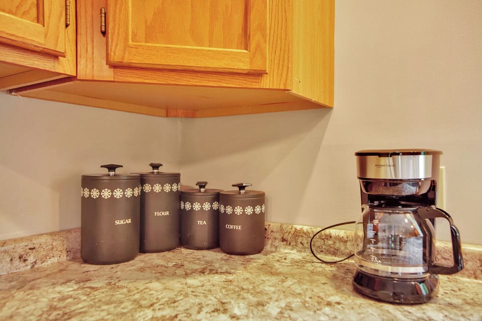 Coffee maker, basket filter, bring your own coffee supplies. 