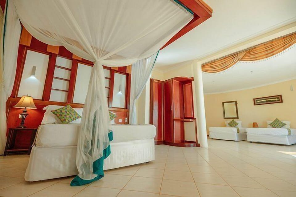 Comfort Double Room, Beach View | In-room safe, laptop workspace, soundproofing, iron/ironing board