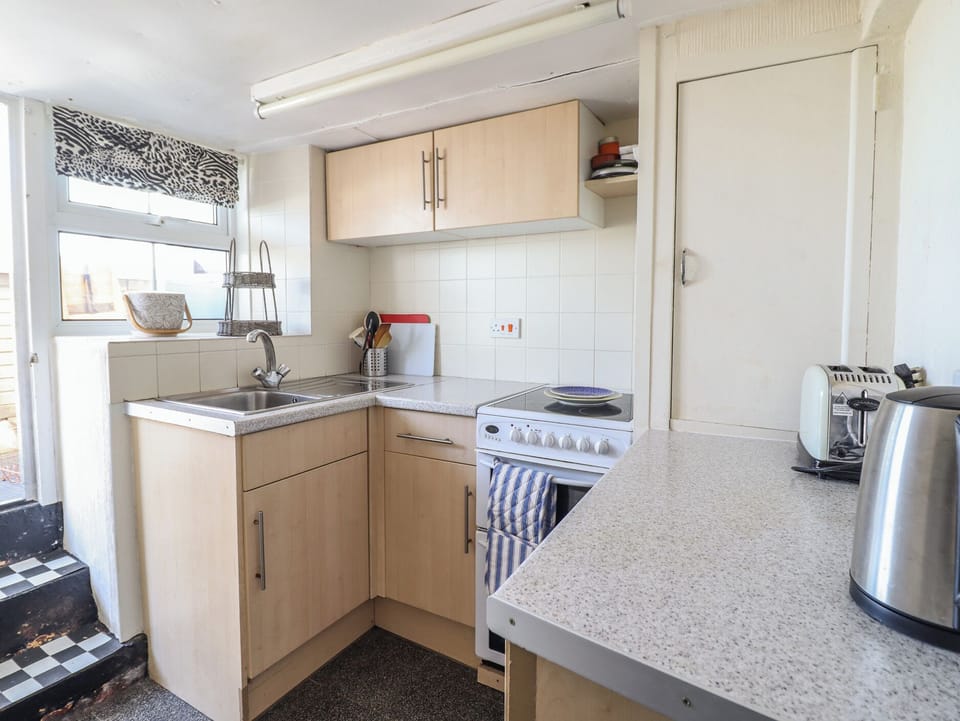 Fridge, microwave, toaster, cookware/dishes/utensils