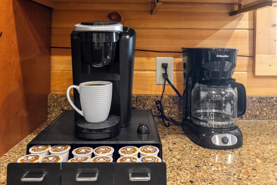 Coffee Corner: Brew your morning joys with our dual coffee makers and gourmet pods!

