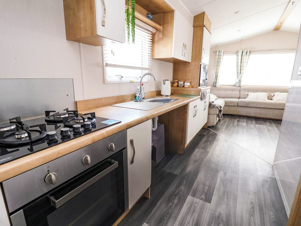 Fridge, microwave, toaster, cookware/dishes/utensils