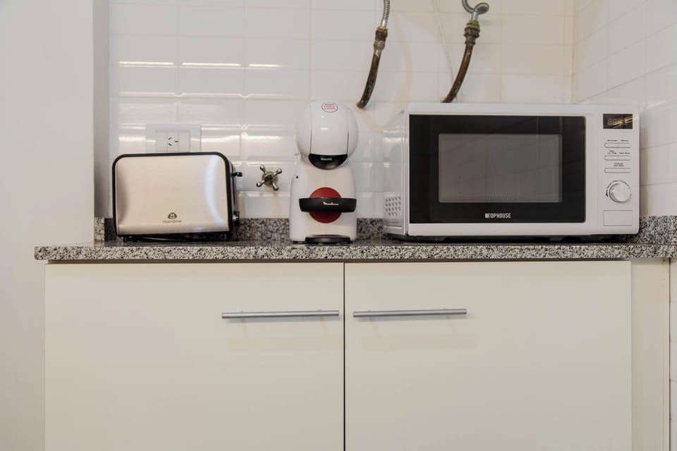 Apartment | Private kitchen | Microwave, oven, stovetop, coffee/tea maker
