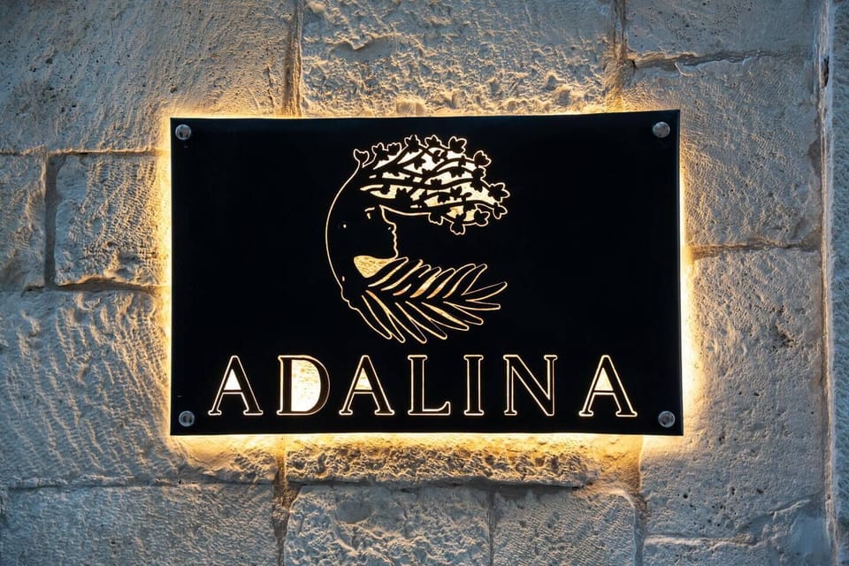 Step into the glow of timeless indulgence at Adalina Luxury Suite.