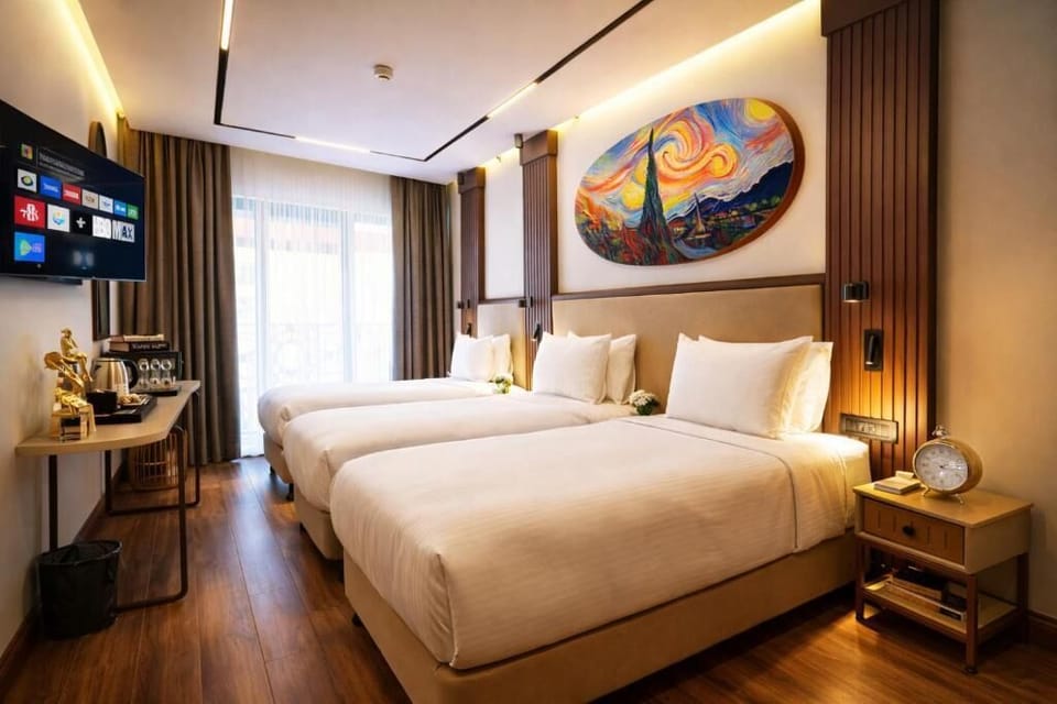 Standard Triple Room, City View | Minibar, iron/ironing board, free WiFi, bed sheets