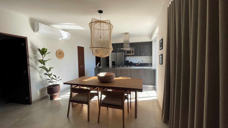 Deluxe Apartment, Beach View | Private kitchen | Fridge, microwave, oven, stovetop