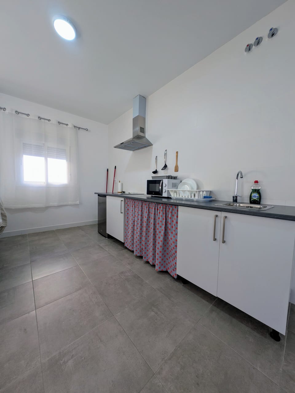 Comfort Apartment, Courtyard View | Private kitchen | Mini-fridge, microwave, stovetop, cookware/dishes/utensils