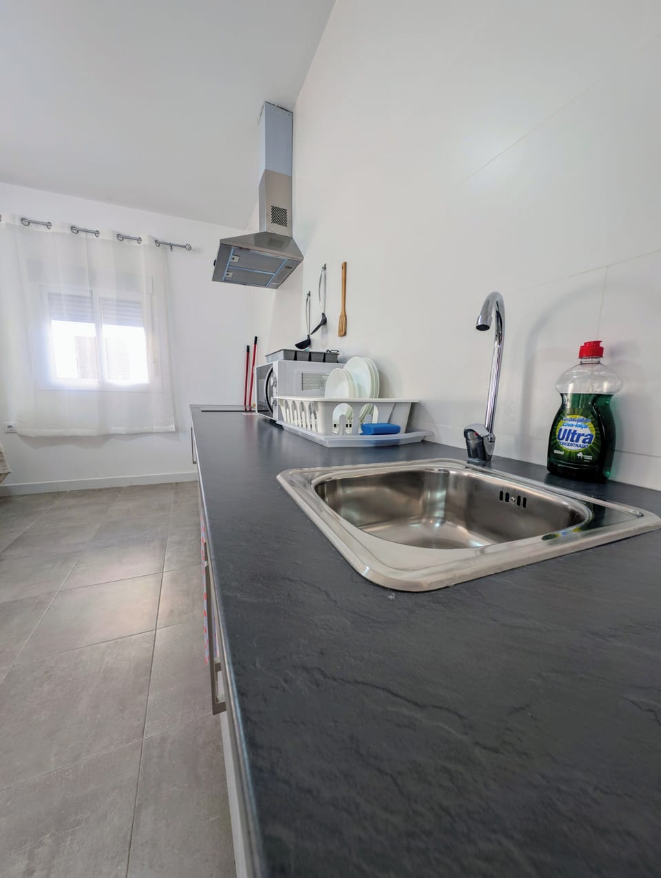 Comfort Apartment, Courtyard View | Private kitchen | Mini-fridge, microwave, stovetop, cookware/dishes/utensils