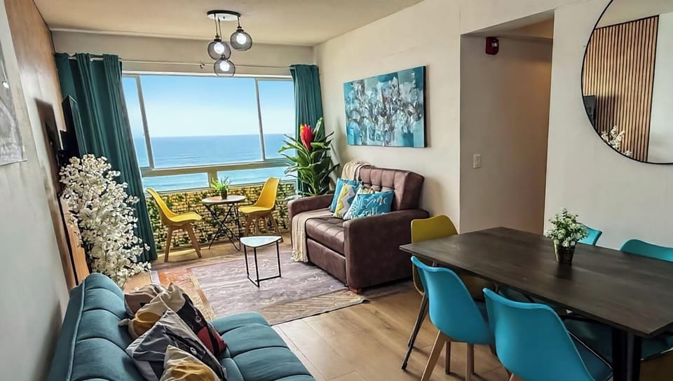 Comfort Apartment, 3 Bedrooms, Balcony, Beach View | Living area | Flat-screen TV