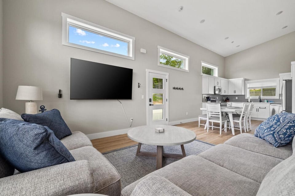 Comfort meets convenience in this bright, connected living area.