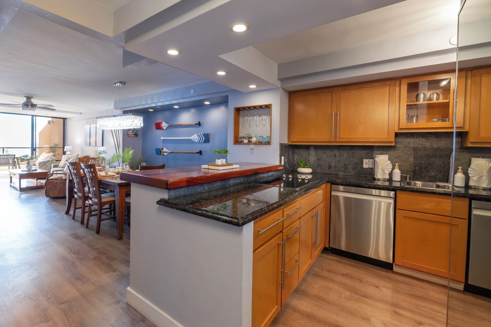 This fully equipped kitchen connects to a stylish dining area, making it easy to entertain or enjoy meals after a day of adventure on the Road to Hana.