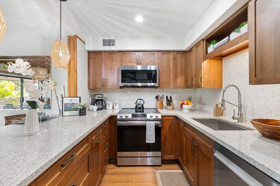 Kitchen with essential appliances and cookware provided for your use.