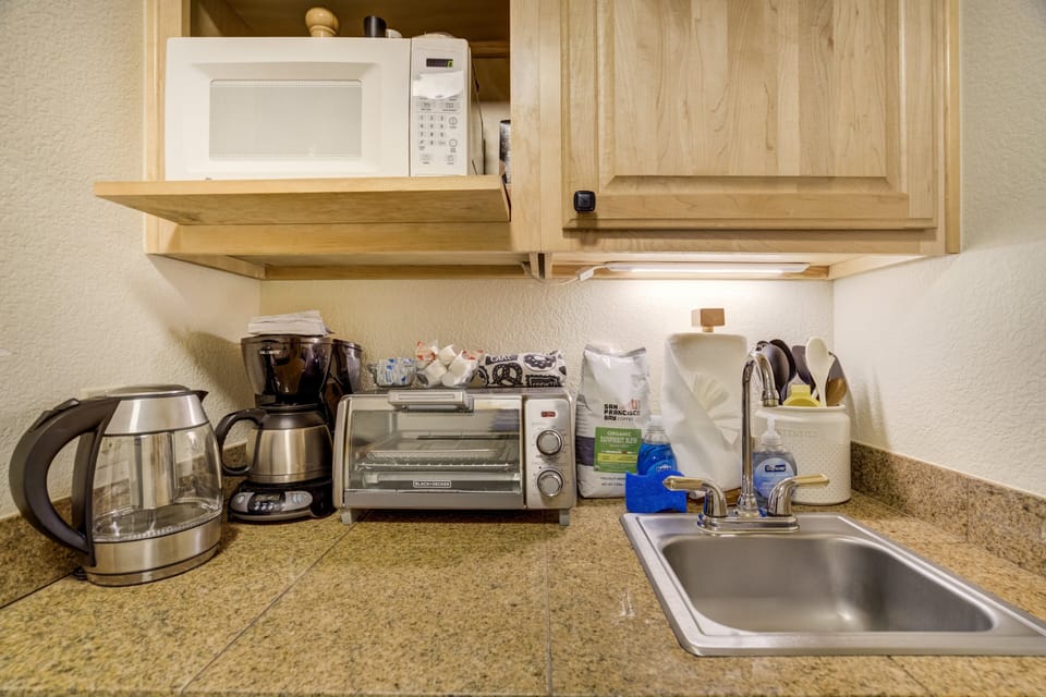 Kitchenette includes everything you need for simple meals: microwave, toaster oven, coffee maker & more.