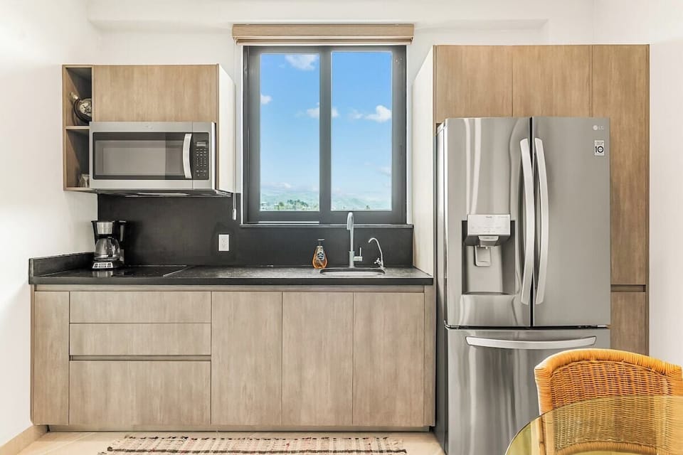 The kitchen, while compact, is packed with everything you'll need.