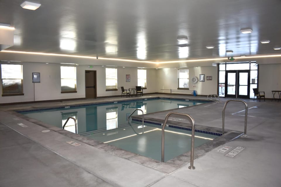Dive into relaxation at our indoor pool, a perfect spot for families to create lasting memories amidst a serene backdrop.