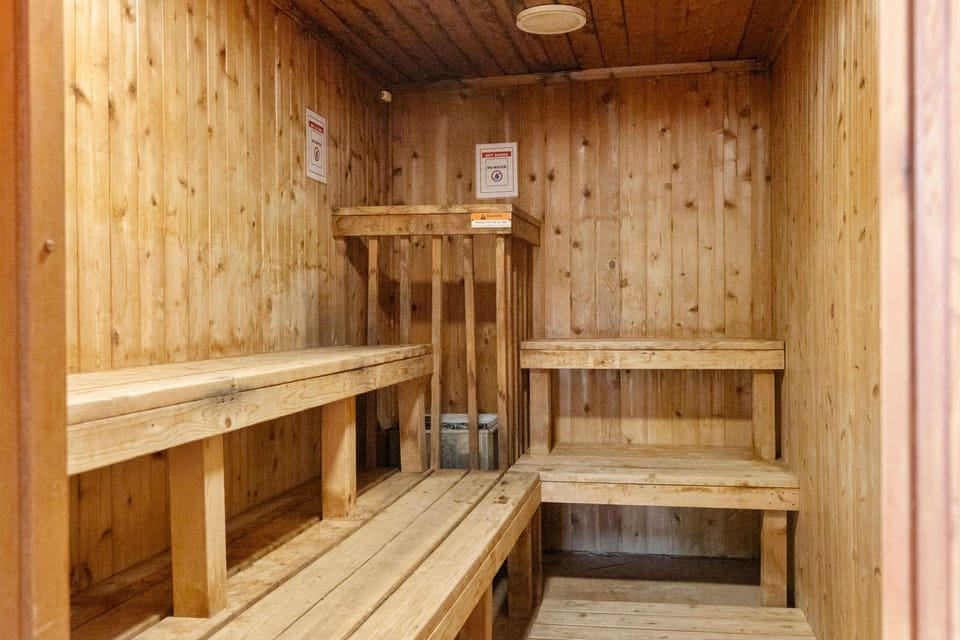 Rejuvenate in the shared amenities, including a sauna that provides relaxation and wellness options.