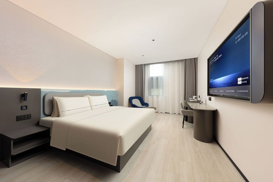 Premium bedding, down comforters, desk, laptop workspace