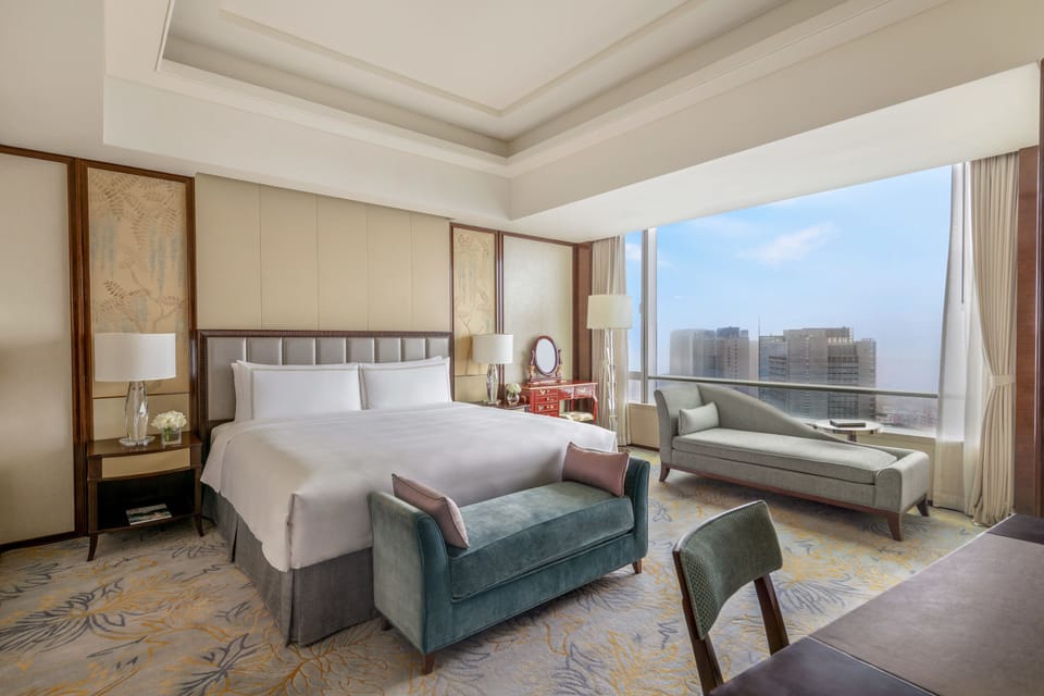 Specialty Suite | 1 bedroom, down comforters, minibar, in-room safe