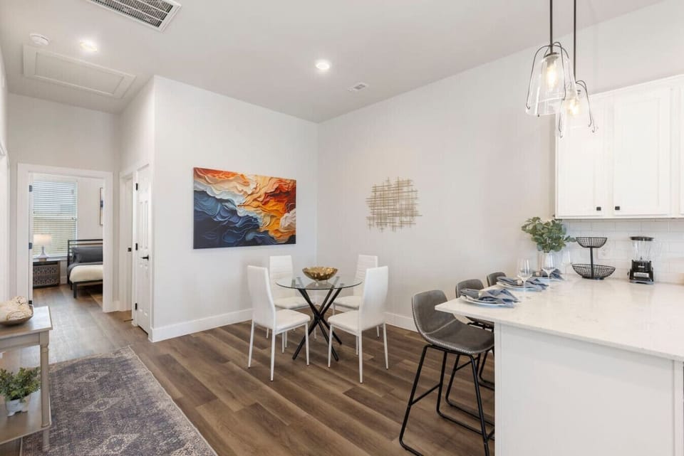 Share meals, sip coffee, or play games in this inviting dining nook just off the kitchen.