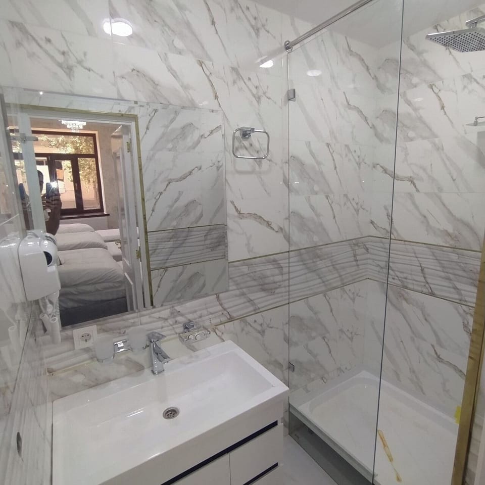 Triple Room | Bathroom | Hair dryer, bathrobes, slippers, towels