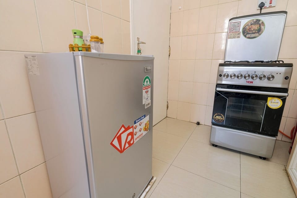 Fridge, microwave, cookware/dishes/utensils