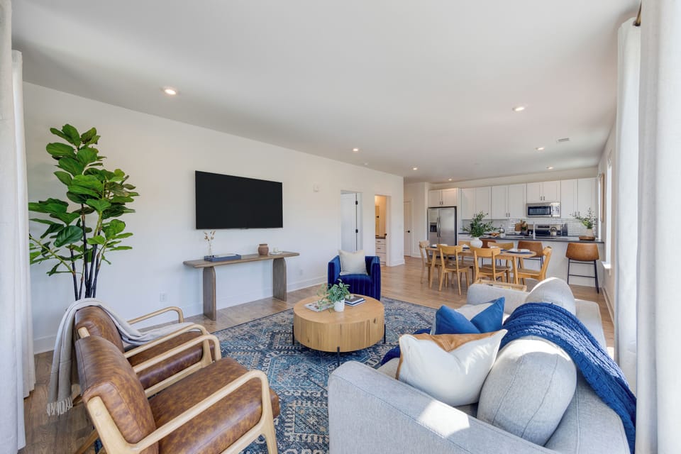Relax with your favorite show on the mounted TV in the living space.