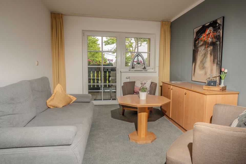 Junior Suite, City View | Living area | TV