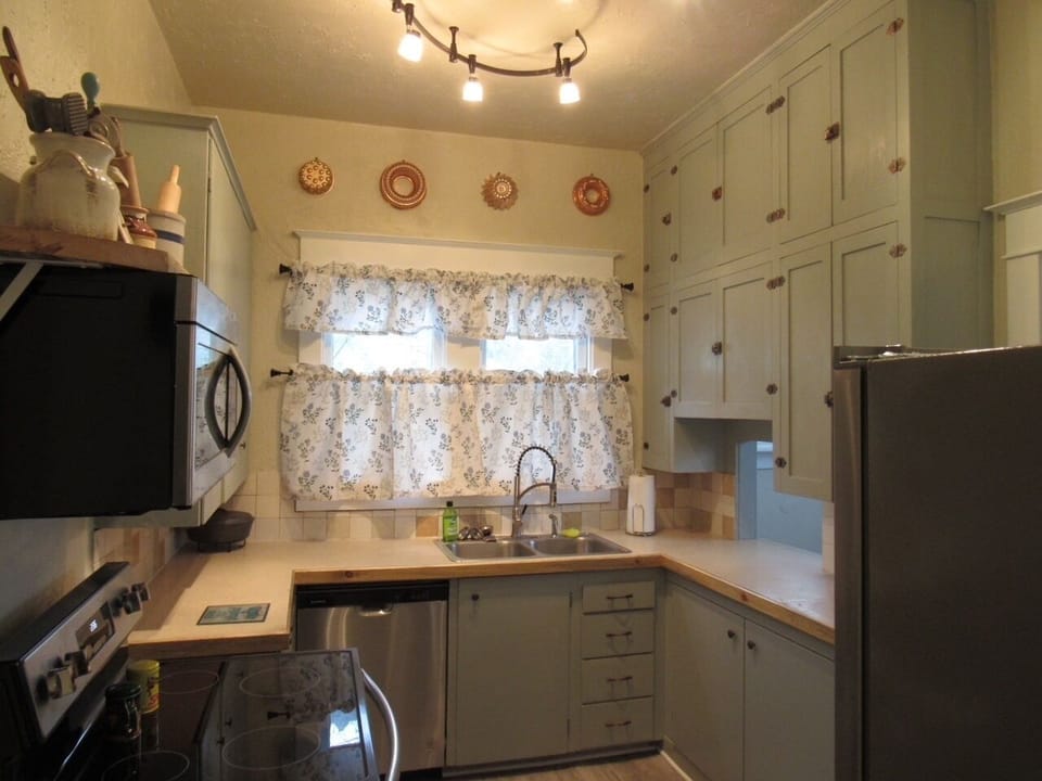 Kitchen includes all cooking and eating needs.