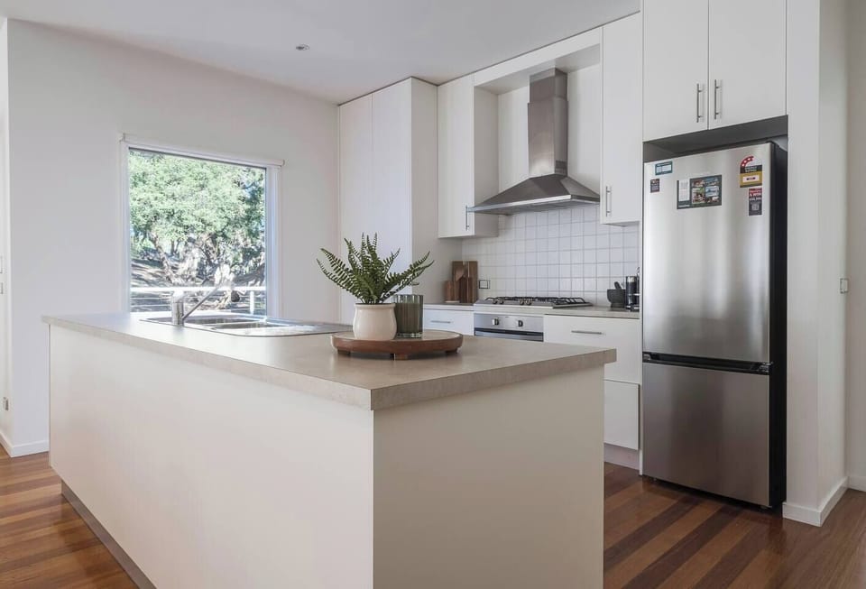 Flow effortlessly from the main living area to the modern kitchen—gather for quick snacks or prep your favourite recipes using an oven, dishwasher, fridge and cooking essentials.
