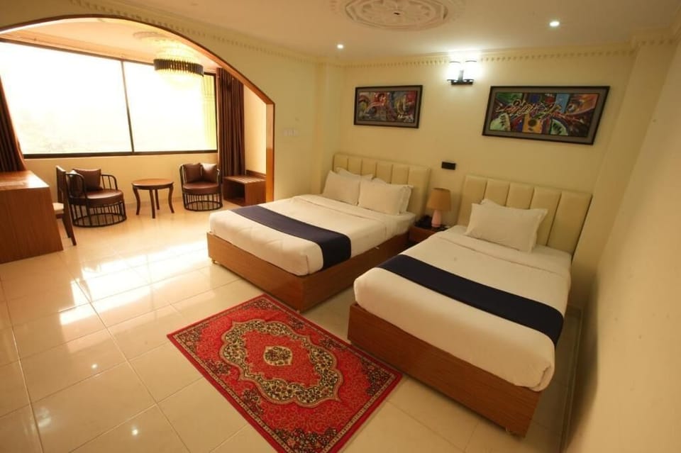Deluxe Triple Room, Balcony, Sea View | In-room safe, desk, laptop workspace, soundproofing