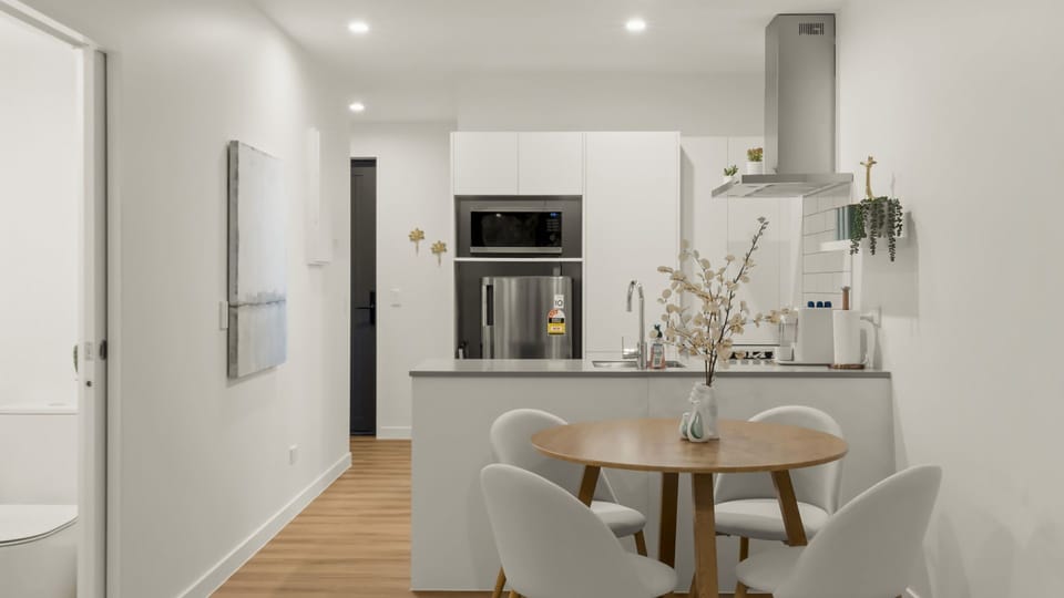 Dining and kitchen with guest powder room