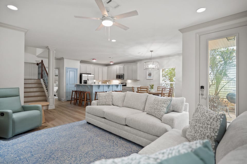 Welcome to Peach by the Beach: a FULLY REMODELED, family friendly beach home in a gated vacation community.  Curl up with a good book or a beachy movie—this comfy living room offers plenty of seating for everyone, from toddlers to grandparents. Sleeps 12