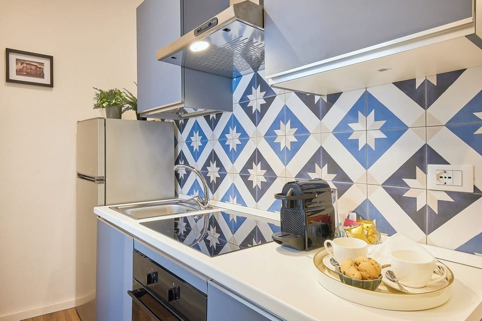 Camera quadrupla Comfort | Private kitchen | Mini-fridge, microwave, oven, espresso maker