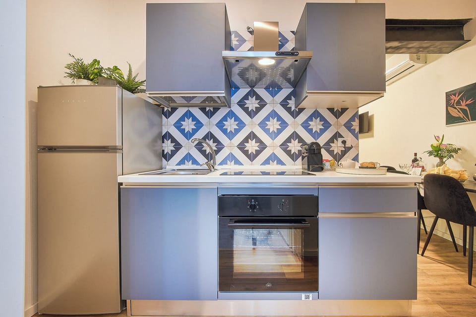 Camera quadrupla Comfort | Private kitchen | Mini-fridge, microwave, oven, espresso maker