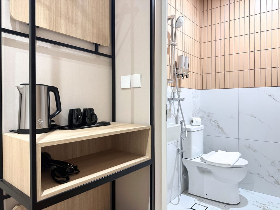 Standard Double Room | Bathroom | Shower, free toiletries, hair dryer, slippers