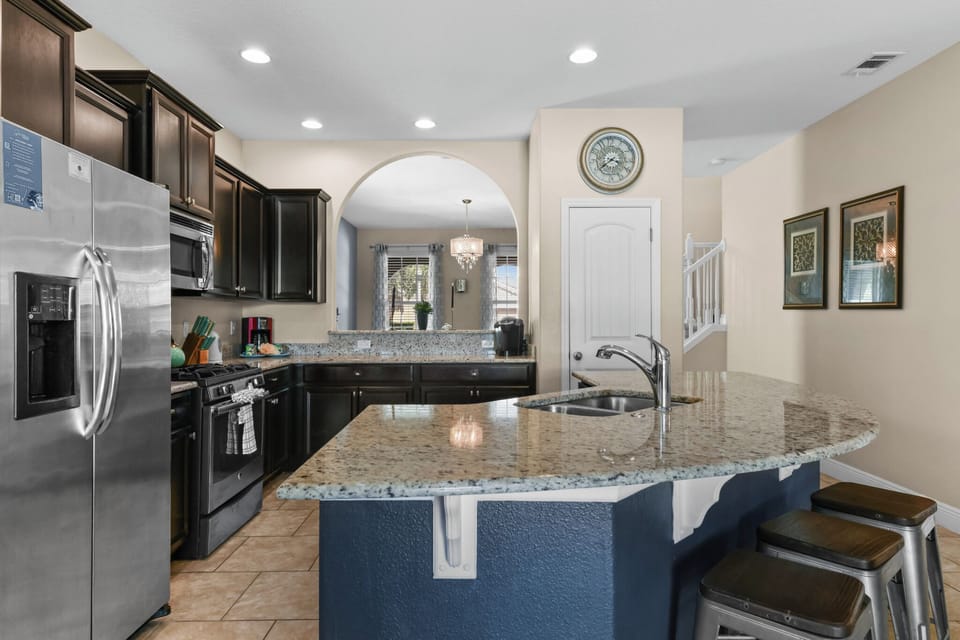 KITCHEN:  Side-by-Side Refrigerator, Microwave, Gas Range and Dishwasher