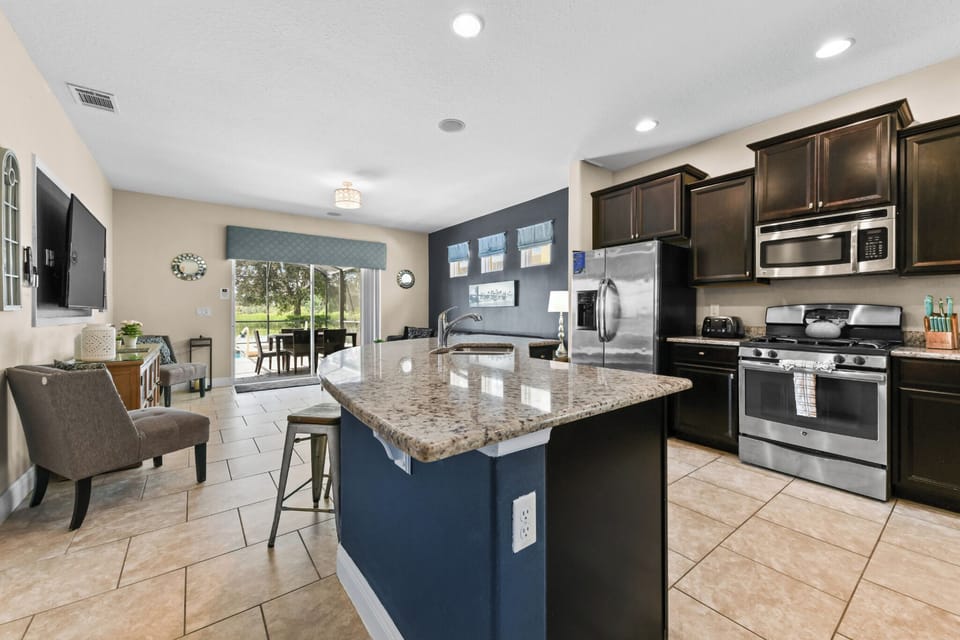 KITCHEN:  Side-by-Side Refrigerator, Microwave, Gas Range and Dishwasher