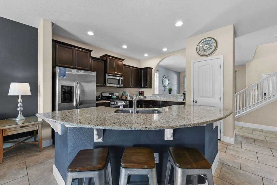 KITCHEN:  Fully Equipped Kitchen with Seating for 3 at Kitchen Island