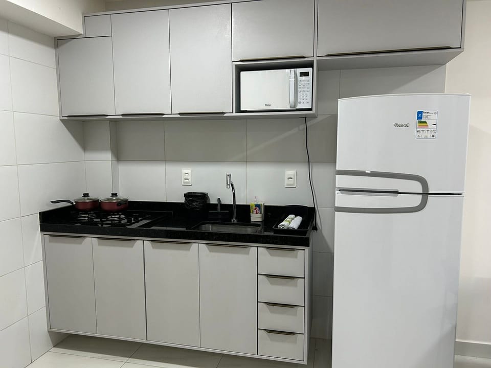 Family Apartment | Private kitchen | Cookware/dishes/utensils, dining tables